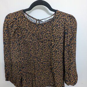 Barely worn leopard-print blouse
